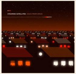 Ein Bild von einem Häusermeer bei Nacht, die Fenster sind in rot, orange und weiß beleuchtet